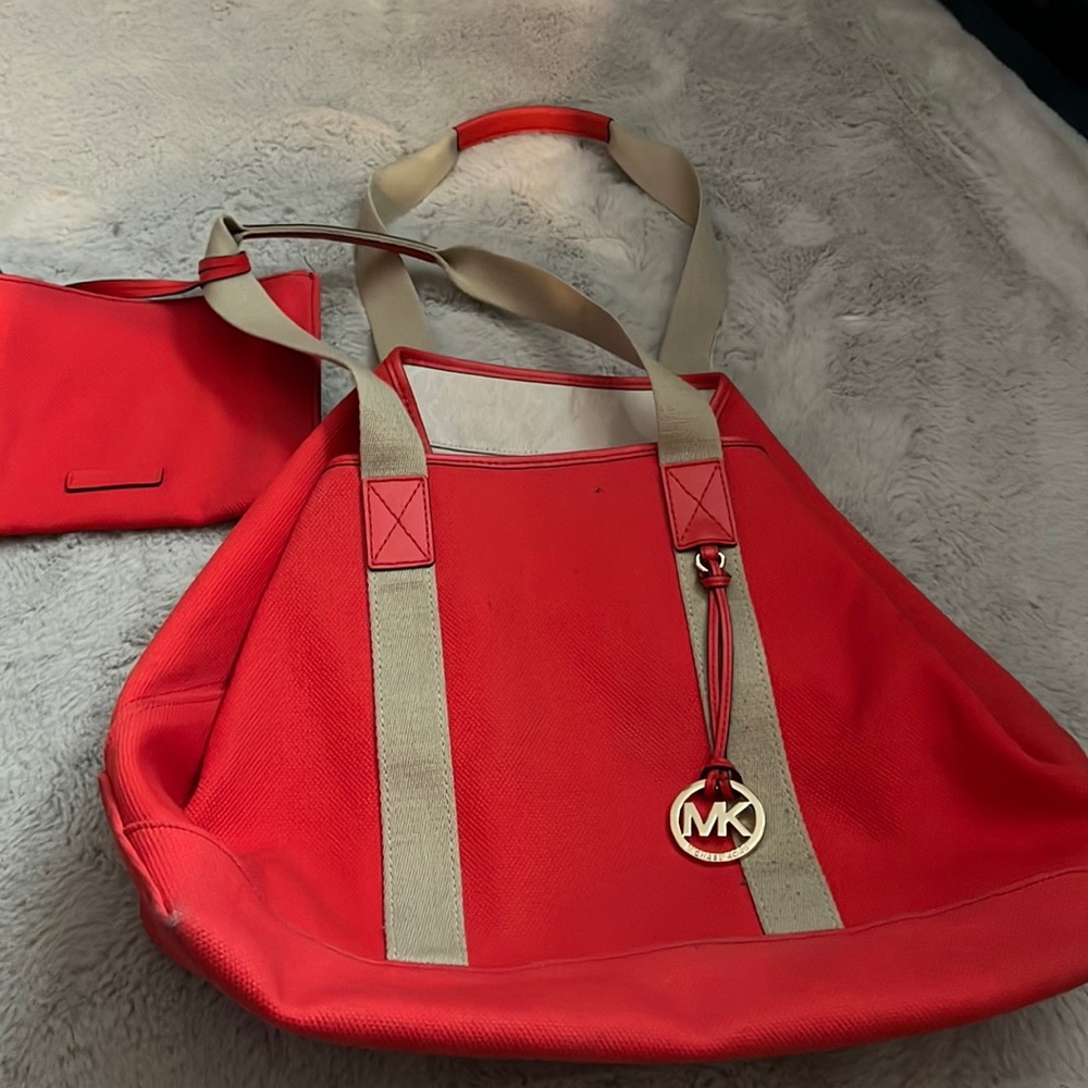 Michael kors large tote  in ok shape with wallet purse some wear as shown
